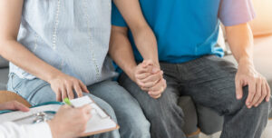 couple consulting with doctor